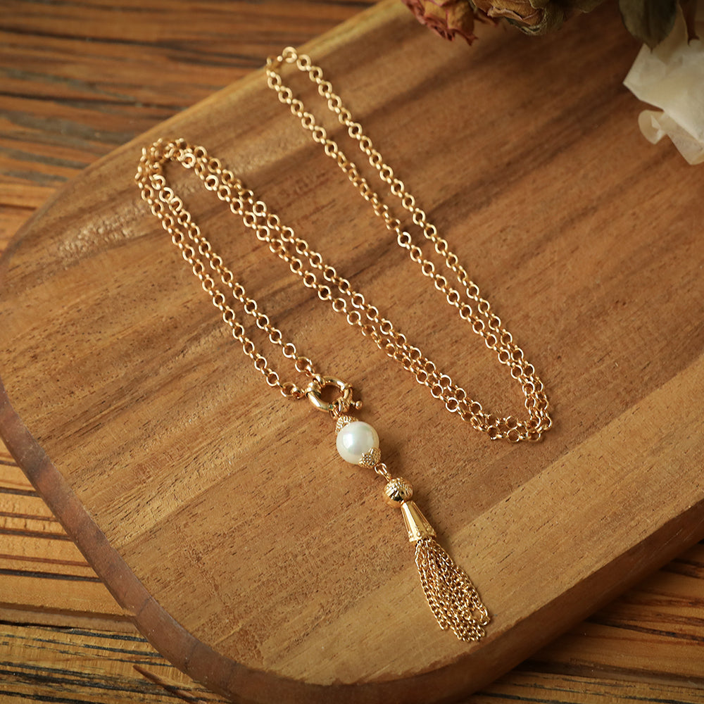 ANDREANI Adventskalender Süsswasserperlen goldfarbig Andreani – Handgemachter Schmuck
