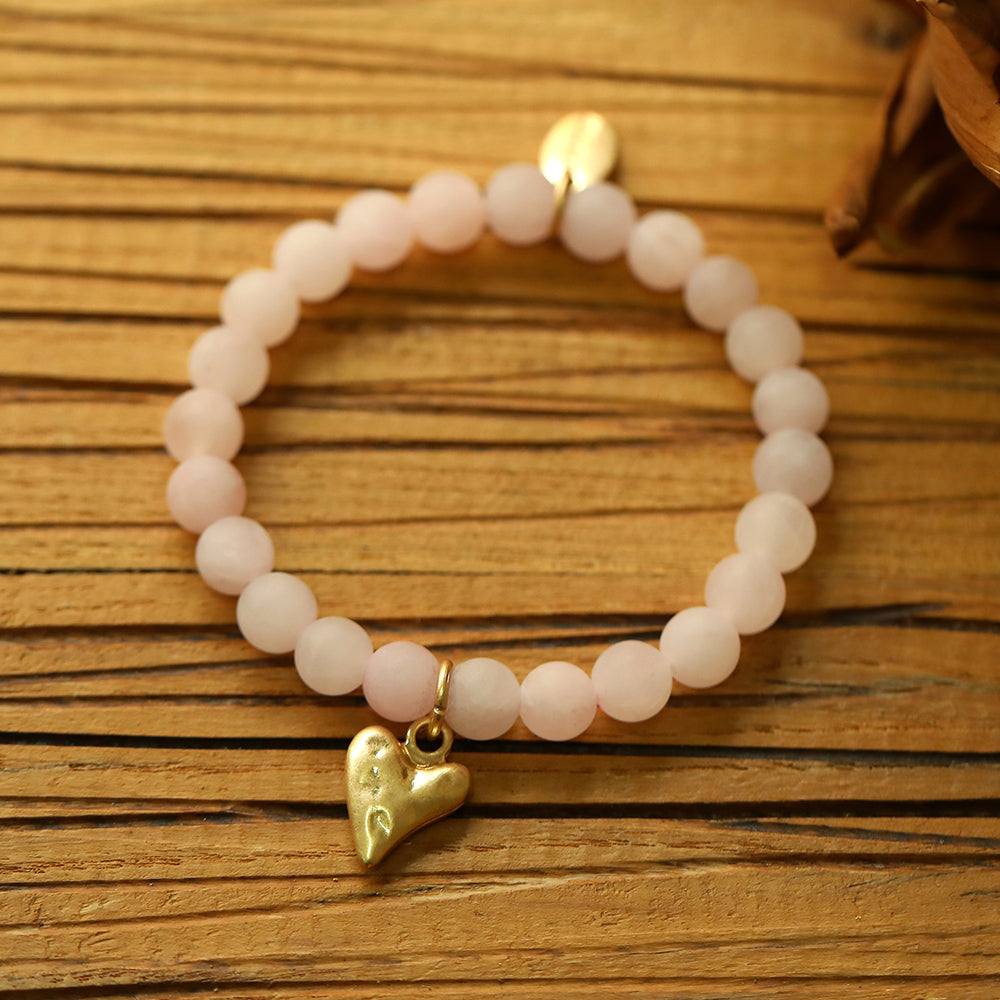 Armband aus echtem Rosenquarz mit Herzanhänger