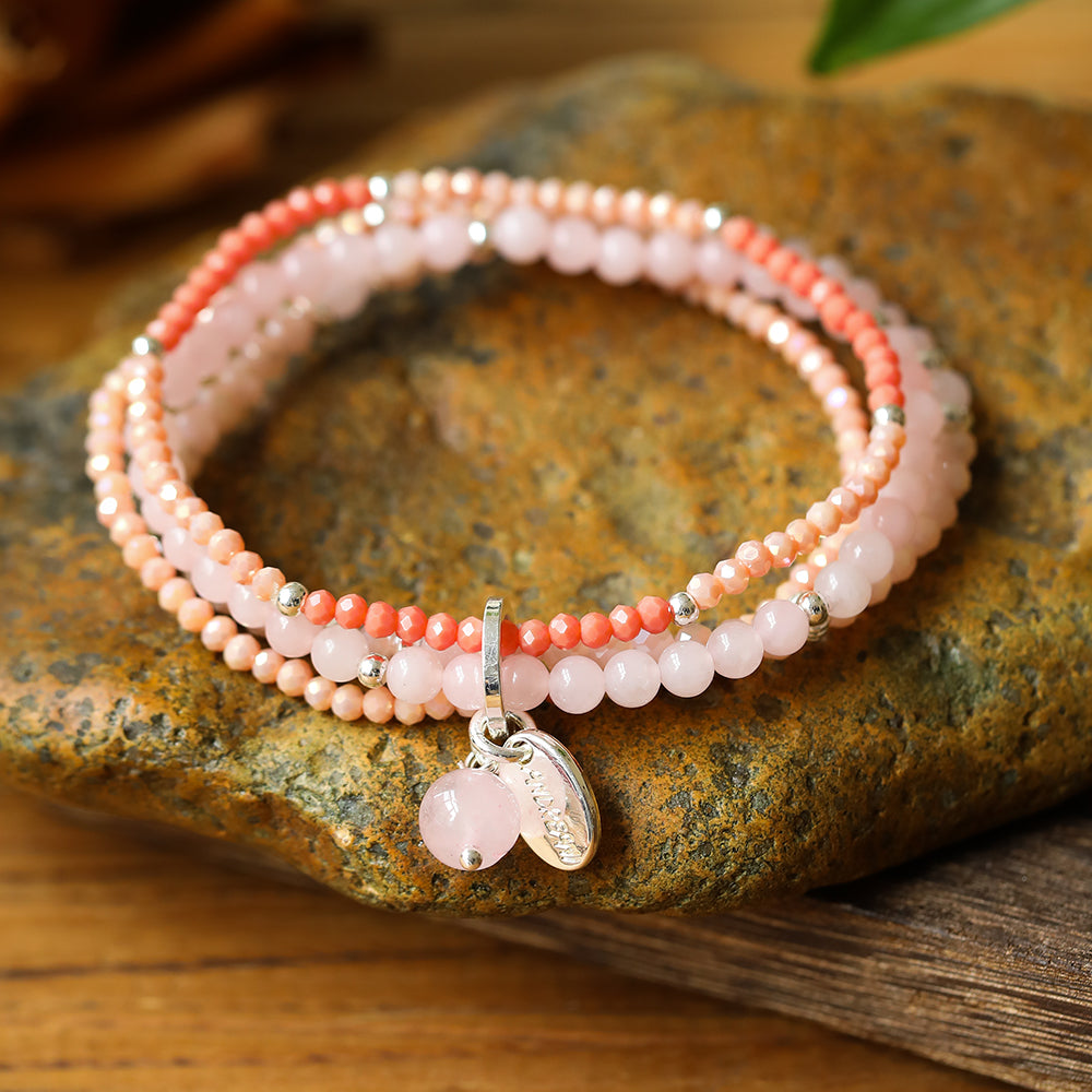 Armband aus Rosenquarz mit Kugelanhänger