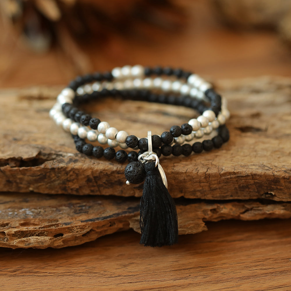Armband aus echtem Lavastein mit schwarzer Quaste