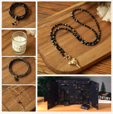 SCHMUCK Adventskalender mit hochwertigen Steinen aus Lava (goldfarbig).