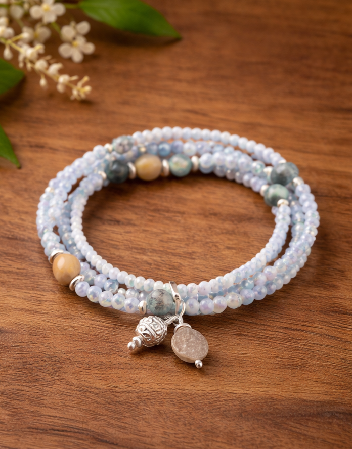 Armband mit Kugelanhänger aus grauem Achat und Glas