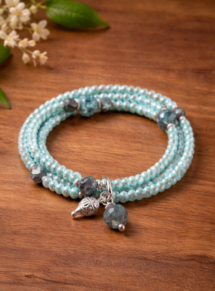 Armband mit Kugelanhänger aus afrikanischem Türkis und Glas