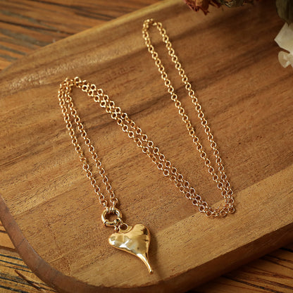 ANDREANI Adventskalender Lavasteine goldfarbig Andreani – Handgemachter Schmuck