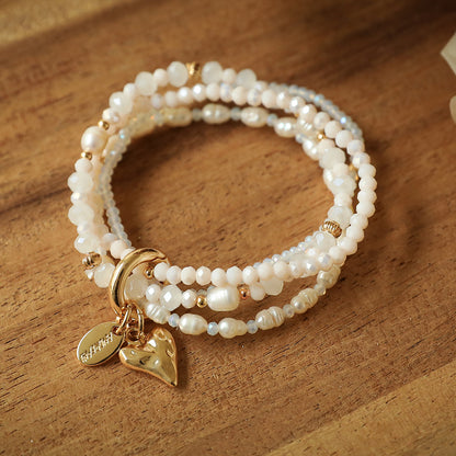 ANDREANI Adventskalender Süsswasserperlen goldfarbig Andreani – Handgemachter Schmuck