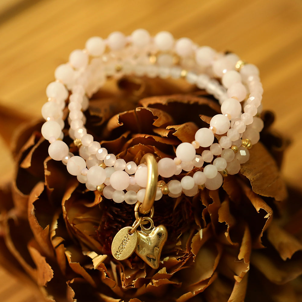 Armband aus echtem Rosenquarz mit Herzanhänger