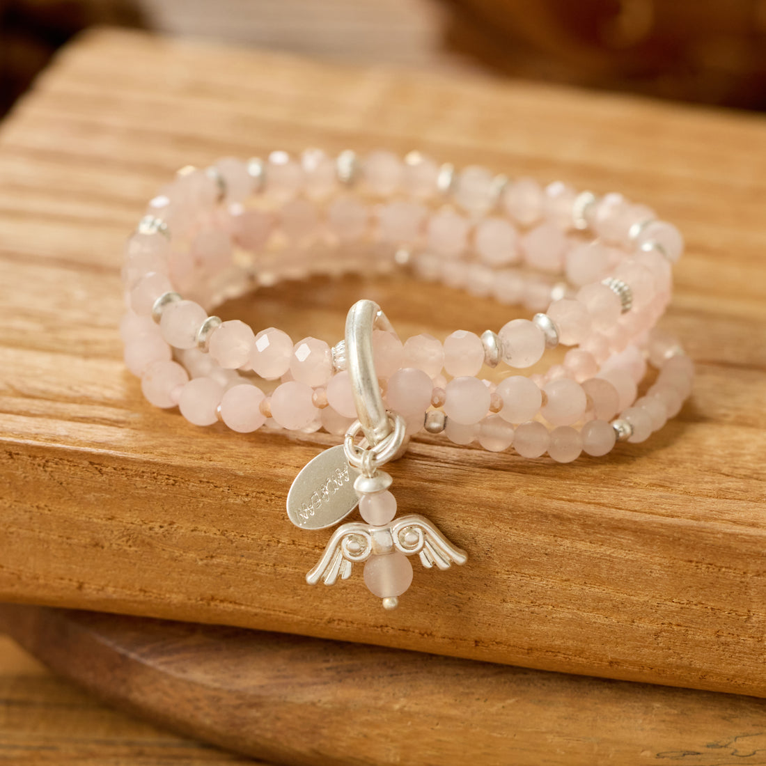 Armband aus Rosenquarz mit Engelanhänger