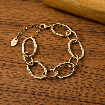 Goldfarbenes Gliederarmband aus rhodiniertem Metall - 19cm