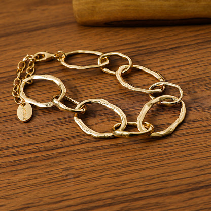 Goldfarbenes Gliederarmband aus rhodiniertem Metall - 19cm