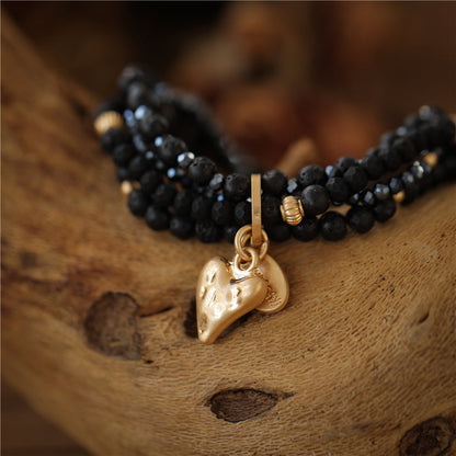 Armband aus echtem Lavastein mit Herzanhänger