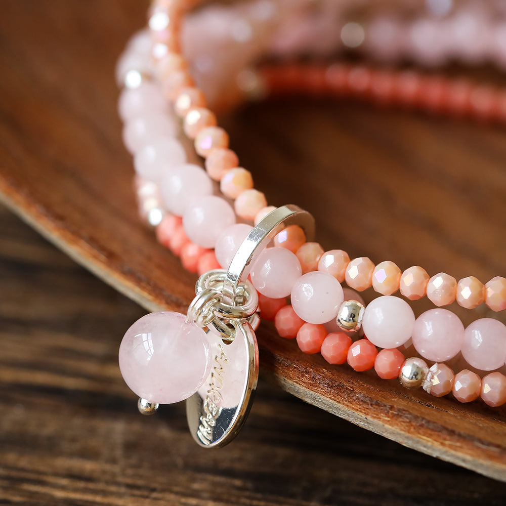 Armband aus Rosenquarz mit Kugelanhänger