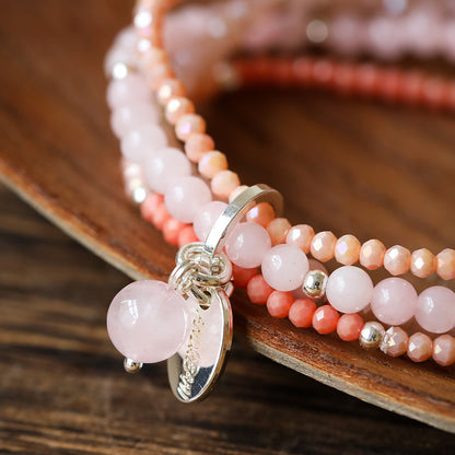 Armband aus Rosenquarz mit Kugelanhänger