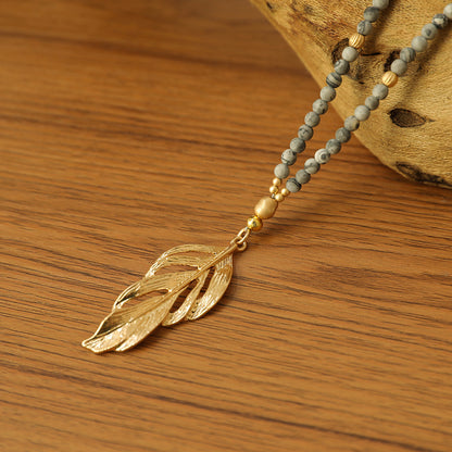 Halskette aus echtem picasso Jaspis mit Federanhänger