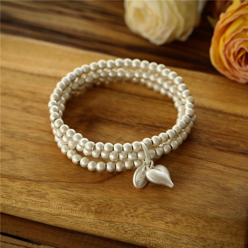 Silberfarbiges Armband aus hochwertigem rhodiniertem Metall mit Herzanhänger